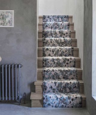 Camo design stair runner with concrete grey wall decor