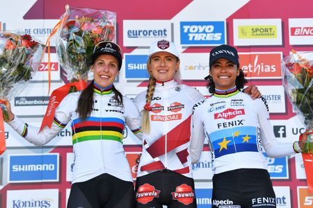 ZONHOVEN BELGIUM OCTOBER 24 LR Lucinda Brand of The Netherlands and Team Baloise Trek Lions on second place race winner Denise Betsema of The Netherlands and Team Pauwels Sauzen Bingoal and Ceylin Del Carmen Alvarado of The Netherlands and Team Alpecin Fenix on third place pose on the podium ceremony after the 25th Zonhoven UCI CycloCross Worldcup 2021 Womens Elite CXWorldCup UCIcyclocrossWC zonhoven on October 24 2021 in Zonhoven Belgium Photo by Luc ClaessenGetty Images