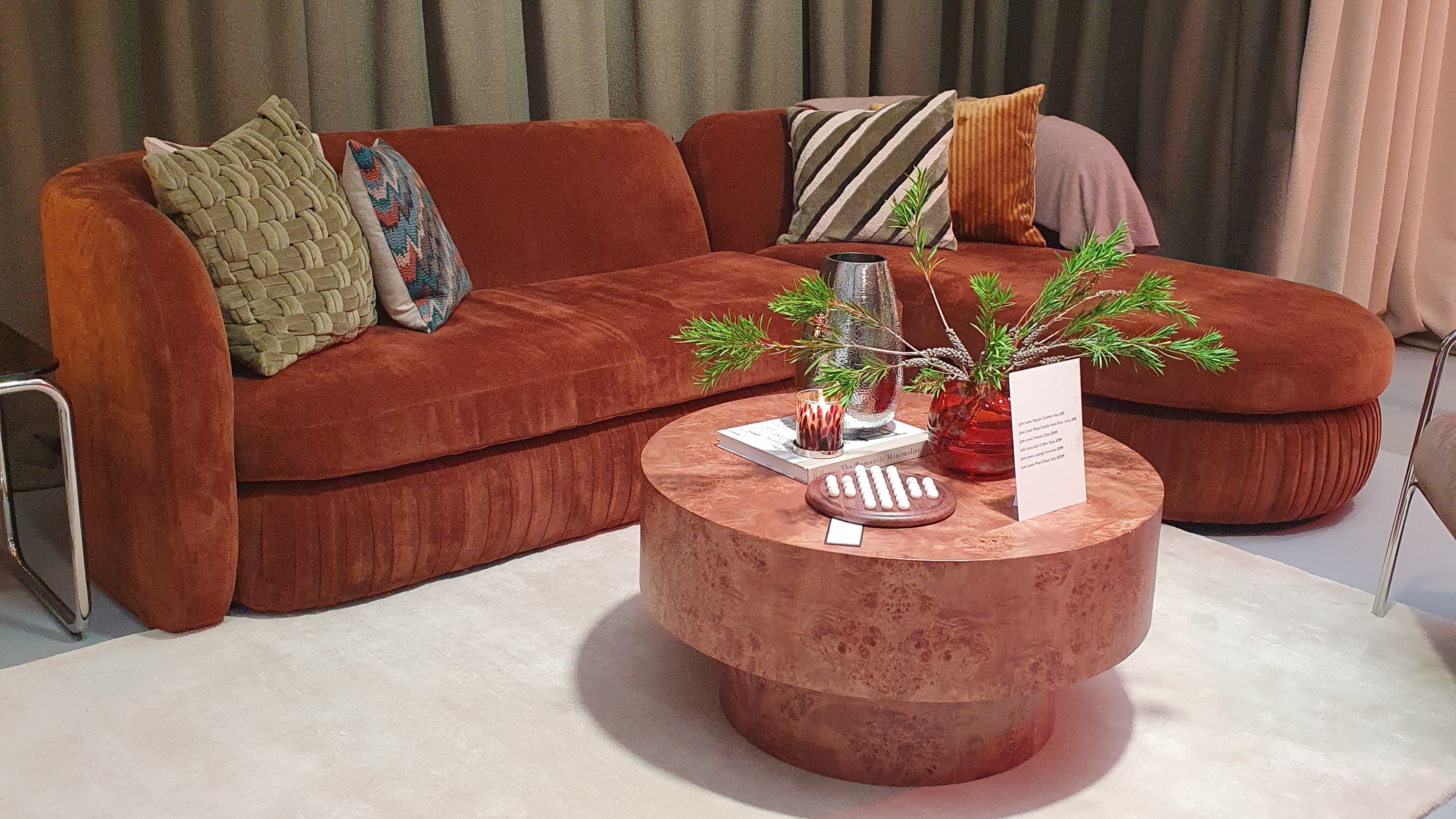 The John Lewis Pleat sofa at the autumn/winter 2025 press preview with a round burl coffee table