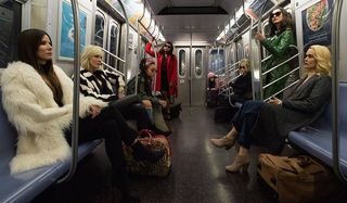 Ocean's 8 Sandra Bullock and her team sit on the subway
