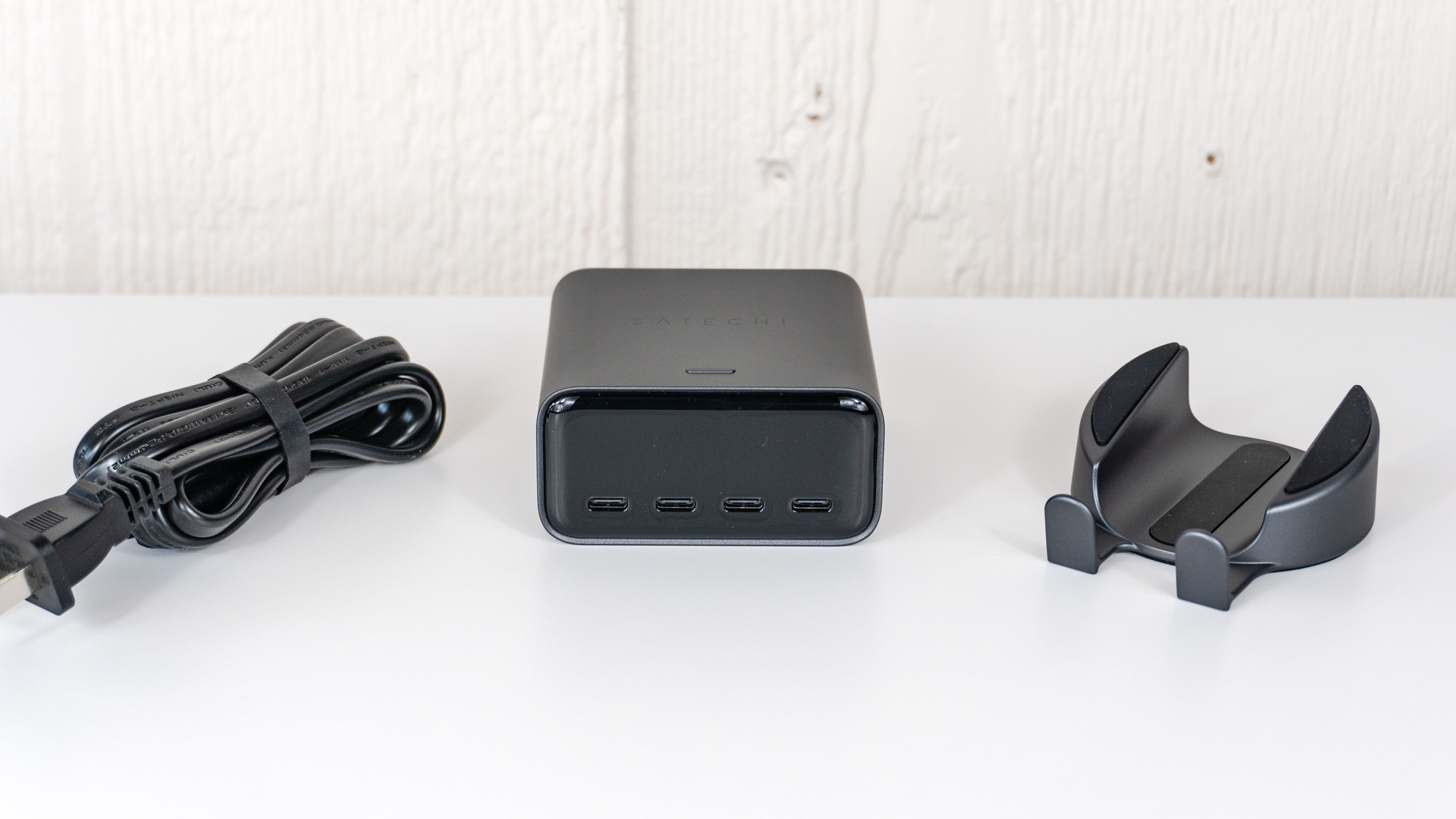 The Satechi ChargeView 140W Desktop Charger unboxed on a table