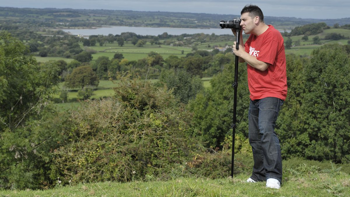 photographer with monopod