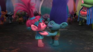 Poppy and Branch dancing in Trolls World Tour