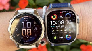the Garmin Fenix 8 and Apple Watch Ultra 3 on the wrist 