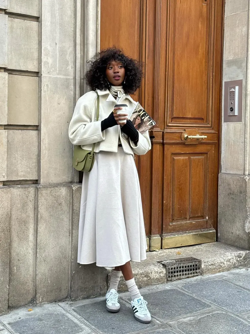 Emmanuelle Koffi wearing Adidas.