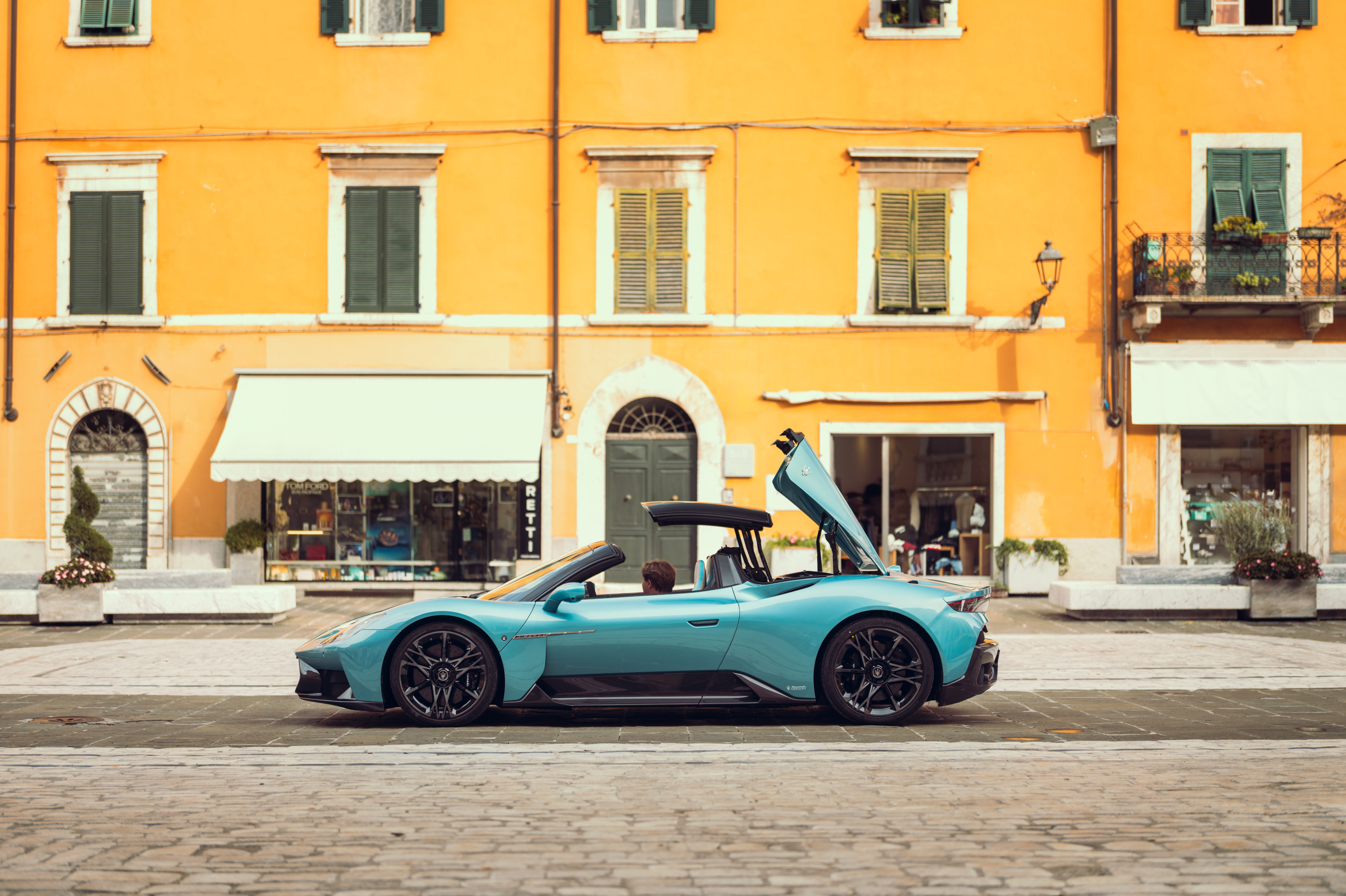 The Maserati MCPURA Cielo struts its supercar stuff, finished in AI Aqua Rainbow from Maserati's Fuoriserie collection