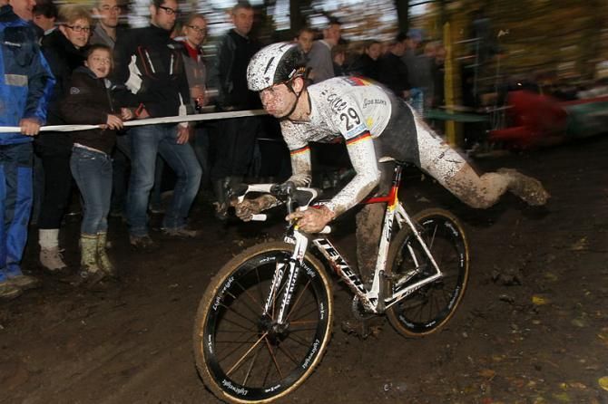 Christoph Pfingsten hops back on his bike