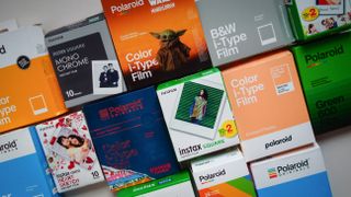 A selection of Instax and Polaroid instant film packages