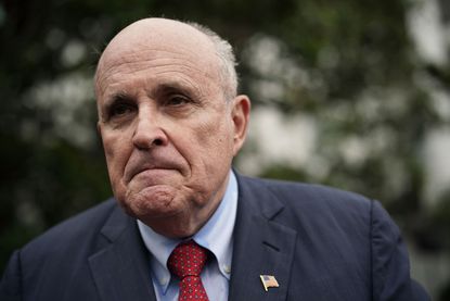 Rudy Giuliani, former New York City mayor and current lawyer for U.S. President Donald Trump, speaks to members of the media during a White House Sports and Fitness Day at the South Lawn of t