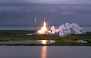 A SpaceX Falcon 9 rocket launches 143 small satellites into orbit from Space Launch Complex 40 at the Cape Canaveral Space Force Station in Florida on Jan. 24, 2021 to mark the Transporter-1 rideshare mission.