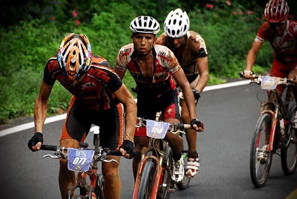At the front of the pack, Manuel 'Manny' Prado looks at the camera.