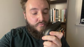 Jacob kissing a Logitech G Pro X Superlight gaming mouse