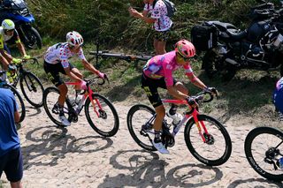 Neilson Powless and Magnus Cort on the cobbles