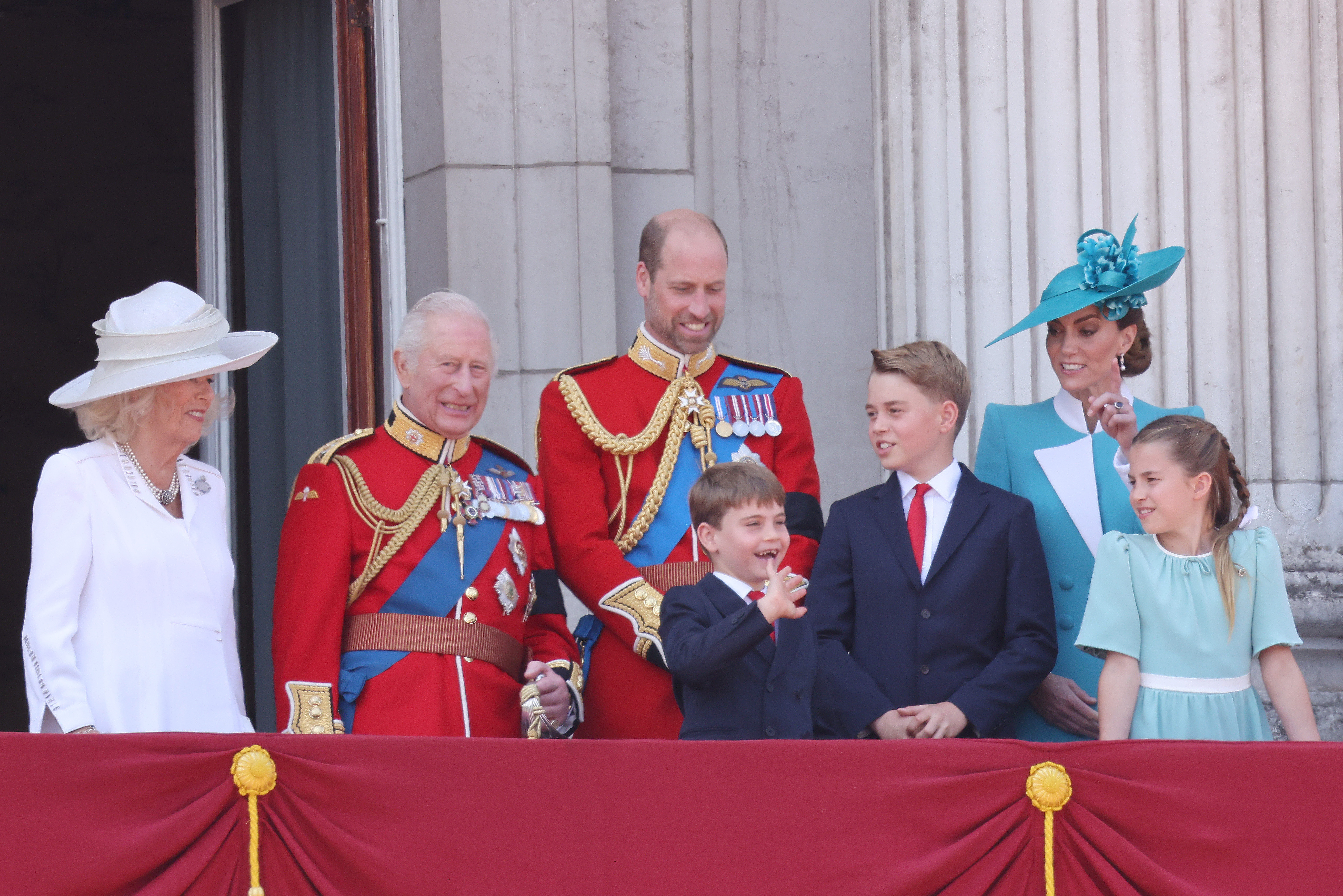 Prince Louis, King Charles, Queen Camilla, Prince William, Prince George, Princess Charlotte and Kate on the balcony during Trooping the Colour