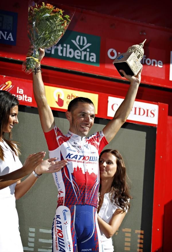 Joaquim Rodriguez (Katusha) salutes from the podium.