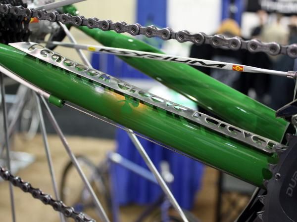 This stainless steel chain stay protector is bolted to the frame on the inner surface of the chain stay for a slick 'floating' effect.