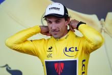 Fabian Cancellara puts on the yellow jersey following stage 2.