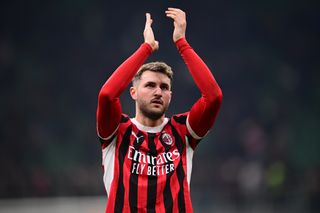 Santiago Gimenez applauds the AC Milan fans after a 3-1 win over Roma in the Coppa Italia in February 2025.