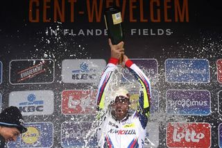 Luca Paolini (Katusha) celebrates his Gent-Wevelgem win with champagne