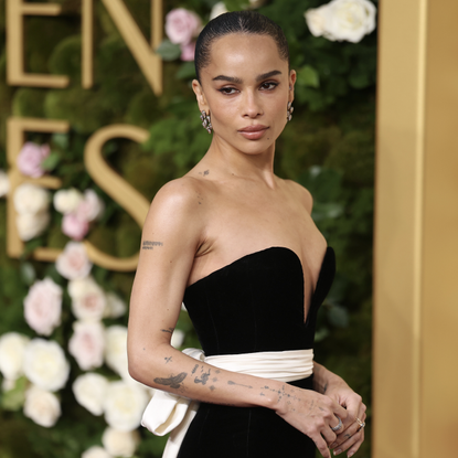 Zoë Kravitz attends the 82nd Annual Golden Globe Awards at The Beverly Hilton on January 05, 2025 in Beverly Hills, California wearing a black saint laurent dress