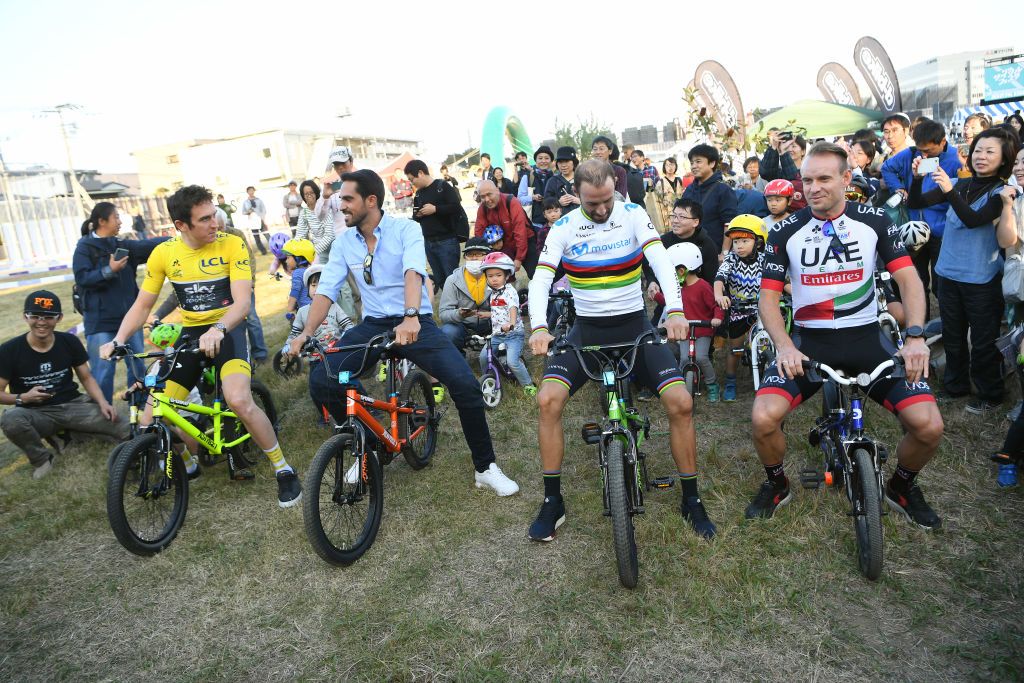The riders line-up on the start line