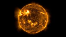 NASA&rsquo;s Solar Dynamics Observatory captured this image of a solar flare &ndash; as seen in the bright flash in the upper left portion of the image &ndash; on April 20, 2022. The image shows a subset of extreme ultraviolet light that highlights the extremely hot material in flares, and which is colorized in yellow.