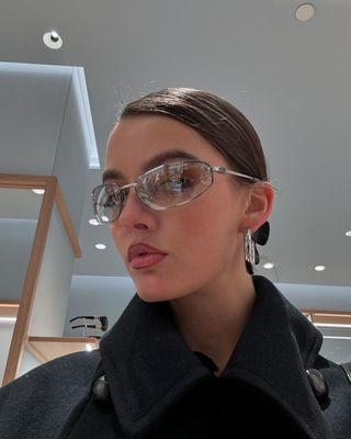 Content creator Mary L. Jean wearing Miu Miu sunglasses.