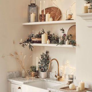 kitchen with Christmas decorations and candles