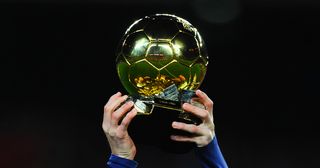 Lionel Messi of FC Barcelona holds up the FIFA Ballon d'Or trophy prior to the La Liga match between FC Barcelona and Athletic Club de Bilbao at Camp Nou on January 17, 2016 in Barcelona, Spain.