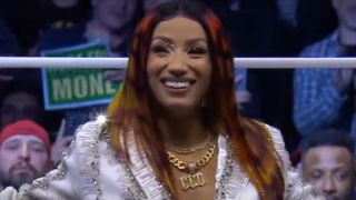 Mercedes Mone smiling for the crowd in AEW