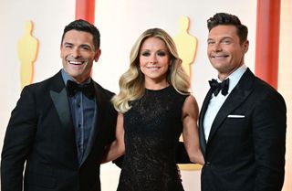 Mark Consuelos, Kelly Ripa and Ryan Seacrest at 95th Oscars. 