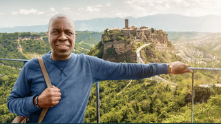 Clive Myrie posing in Italy