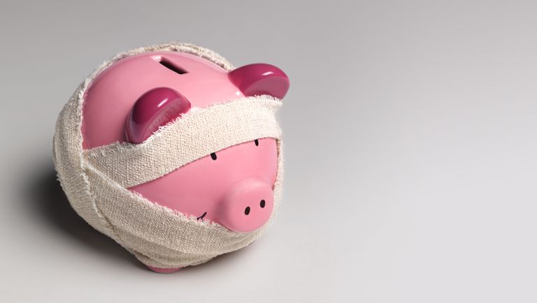 pig piggy bank with bandage