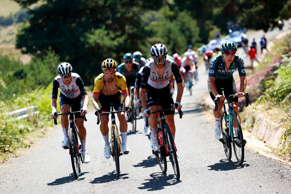 VILLARCAYO SPAIN AUGUST 17 LR Jay Vine of Australia and UAE Team Emirates Primo Roglic of Slovenia and Team JumboVisma and Adam Yates of Great Britain and UAE Team Emirates compete in the breakaway climbing to the Picn Blanco 1498m during the 45th Vuelta a Burgos 2023 Stage 3 a 183km stage from Sargentes de la Lora to Villarcayo on August 17 2023 in Villarcayo Spain Photo by Gonzalo Arroyo MorenoGetty Images