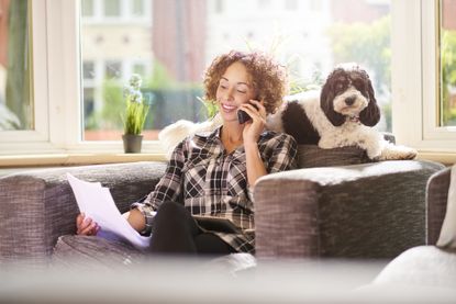 woman paying insurance over the phone