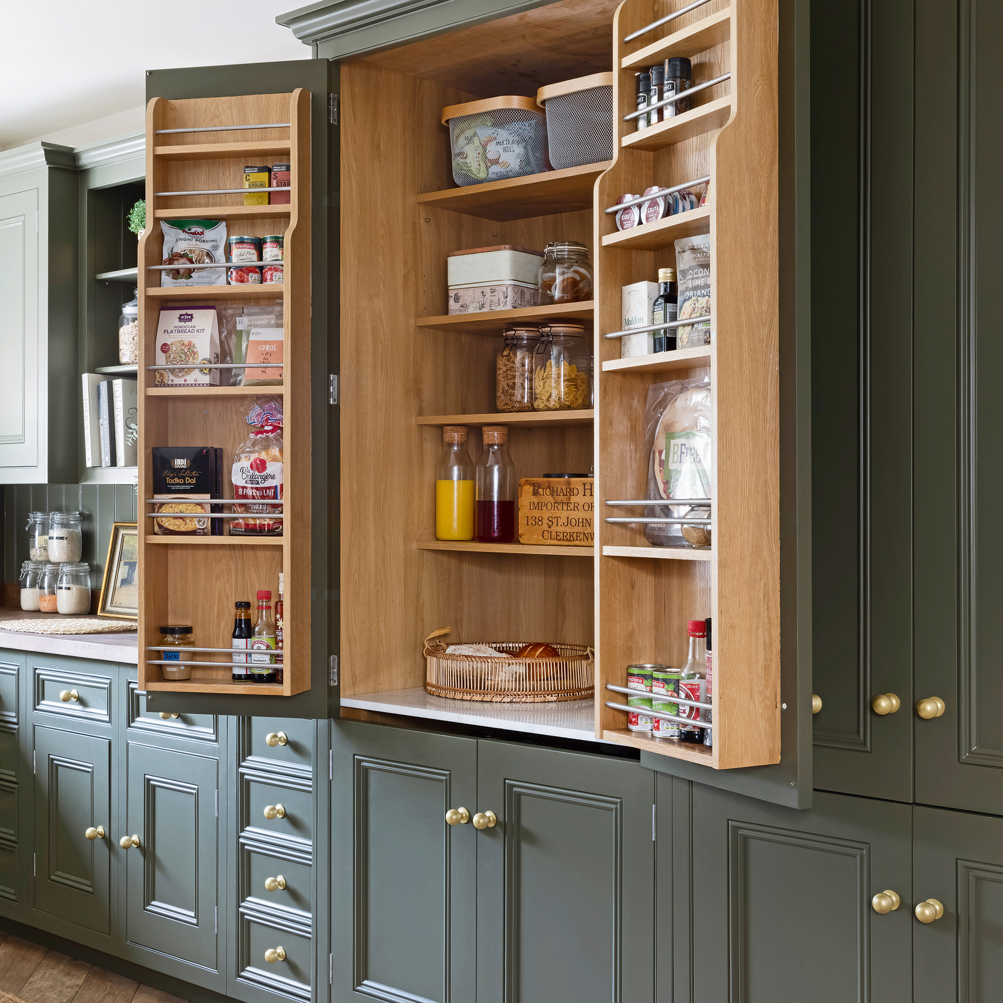 secondhand green cabinetry with open dresser with wooden interior and dry goods