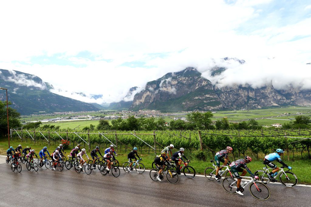 LAVARONE ITALY MAY 25 A general view of Felix Gall of Austria Nicolas Prodhomme of France and AG2R Citroen Team Mathieu Van Der Poel of Netherlands and Team Alpecin Fenix Santiago Buitrago Sanchez of Colombia and Team Bahrain Victorious Filippo Zana of Italy and Team Bardiani CSF Faizane Luca Covili of Italy and Team Bardiani CSF Faizane Guillaume Martin of France and Team Cofidis Simone Ravanelli of Italy and Team Drone Hopper Androni Giocattoli Sidermec Hugh Carthy of United Kingdom Diego Andres Camargo Pineda of Colombia and Team EF Education Easypost Lorenzo Fortunato of Italy and EoloKometa Cycling Team Diego Rosa of Italy and EoloKometa Cycling Team Attila Valter of Hungary and Team Groupama FDJ Jan Hirt of Czech Republic and Team Intermarch Wanty Gobert Matriaux Rein Taaramae of Estonia and Team Intermarch Wanty Gobert Matriaux Koen Bouwman of Netherlandsblue mountain jersey Gijs Leemreize of Netherlands and Team Jumbo Visma Sam Oomen of Netherlands and Team Jumbo Visma Antonio Pedrero Lopez of Spain and Movistar Team Mauri Vansevenant of Belgium and Team QuickStep Alpha Vinyl Damien Howson of Australia and Team BikeExchange Jayco Thymen Arensman of Netherlands and Team DSM Giulio Ciccone of Italy and Team Trek Segafredo and Alessandro Covi of Italy and UAE Team Emirates compete in the breakaway passing through the Glovo 611m mountain landscape during the 105th Giro dItalia 2022 Stage 17 a 168 km stage from Ponte di Legno to Lavarone 1161m Giro WorldTour on May 25 2022 in Lavarone Italy Photo by Michael SteeleGetty Images