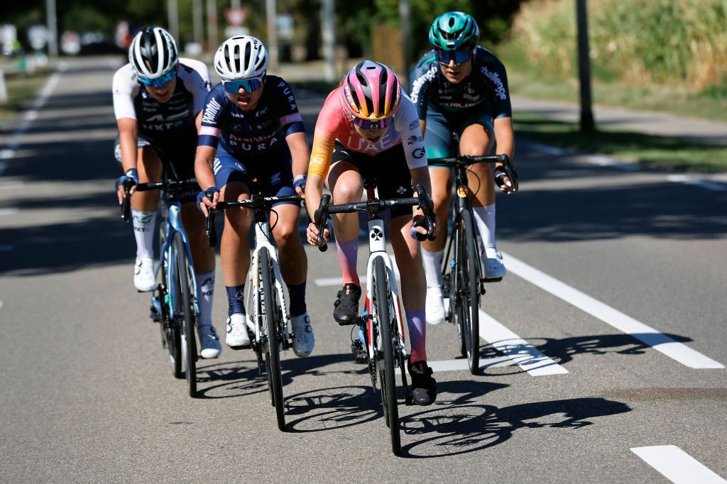 GENNEP NETHERLANDS SEPTEMBER 01 LR Justine Ghekiere of Belgium and Team PlanturPura and Sophie Wright of United Kingdom and UAE Team Adq compete in the breakaway during the 25th Simac Ladies Tour 2022 Stage 3 a 1391km stage from Gennep to Gennep SLT2022 UCIWWT on September 01 2022 in Gennep Netherlands Photo by Bas CzerwinskiGetty Images