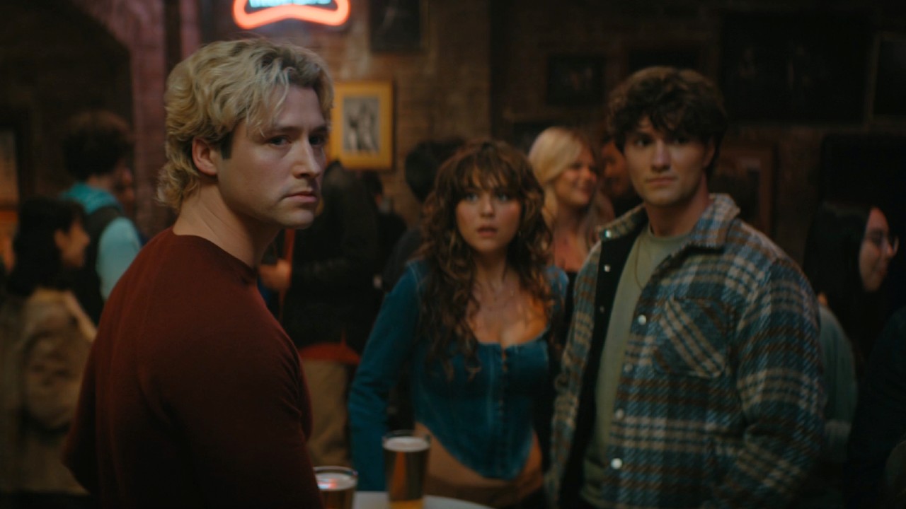 Dean looking over his shoulder angrey while Allie and Beau stand behind him in shock.