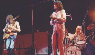 (from left) Steve Howe, Jon Anderson, and Bill Bruford perform with Yes at the Rainbow Theatre, London on January 14, 1972
