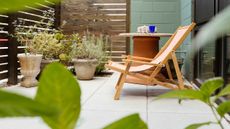 best patio cleaner: patio with deckchair and plants