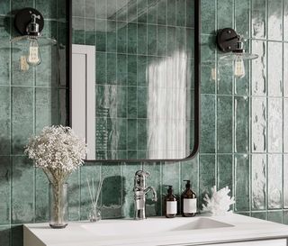 Green vertical tiles in a bathroom around a sink