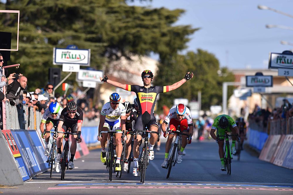 Jens Debusschere (Lotto-Soudal) raises his arms after winning the stage