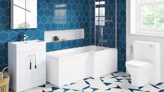 shower bath with patterned tiled floor and blue wall tiles