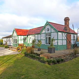 skipwith station with house exterior and garden