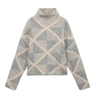 flat lay image of grey jumper