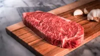 Wagyu beef on a chopping board