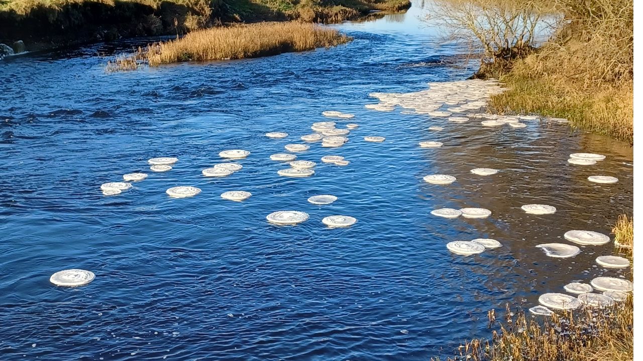 The ice pancakes on the move down the river.
