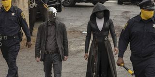 Tim Blake Nelson and Regina King in Watchmen