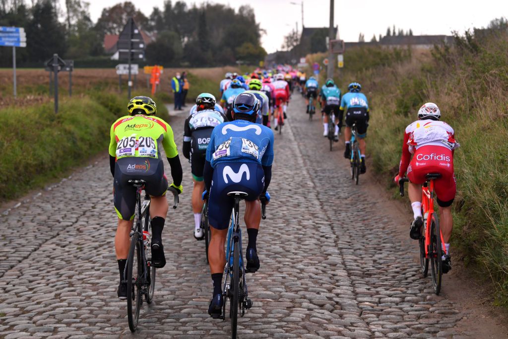 OUDENAARDE BELGIUM OCTOBER 18 Joel Suter of Switzerland and Team Bingoal WB Sebastian Mora Vedri of Spain and Movistar Team Peloton Cobblestones Landscape during the 104th Tour of Flanders 2020 Ronde van Vlaanderen Men Elite a 2433km race from Antwerpen to Oudenaarde RVV20 FlandersClassic on October 18 2020 in Oudenaarde Belgium Photo by Luc ClaessenGetty Images